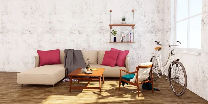 Salon lumineux et épuré aux murs neutres, mobilier discret et surfaces dégagées
